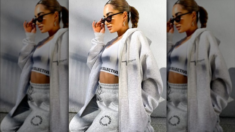 woman in a gray hoodie