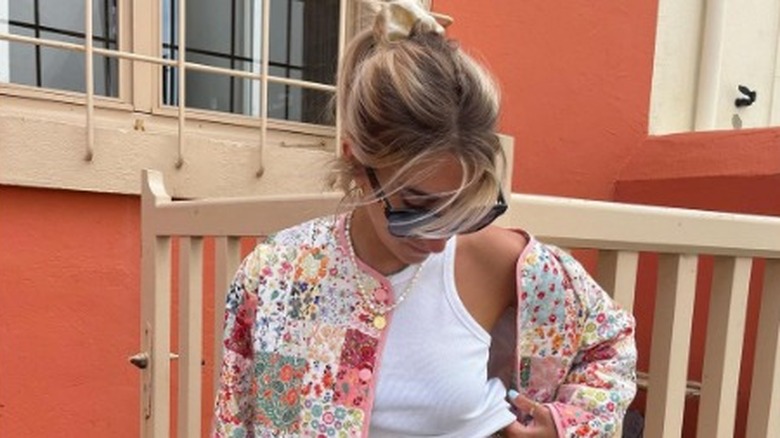 Woman wearing rough pearl necklace