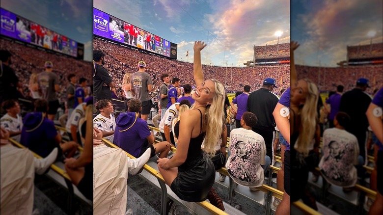 Olivia "Livvy" Dunne wearing an all-black outfit at an LSU game