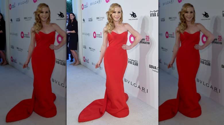 Tara Lipinski in a red strapless gown with a train