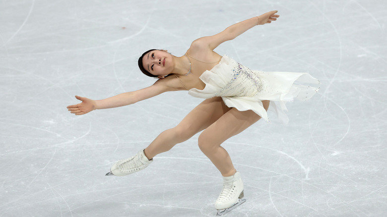 Shin Ji-a wearing a white dress