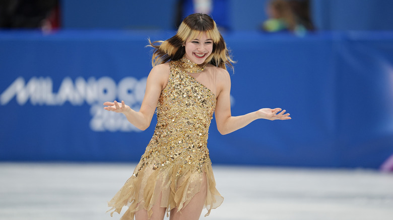 Alysa Liu wearing a gold dress