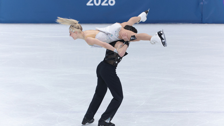 Paul Poirier and Piper Gilles doing a lift