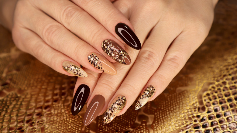 Neutral ombré cascading nails, glitter embellishments