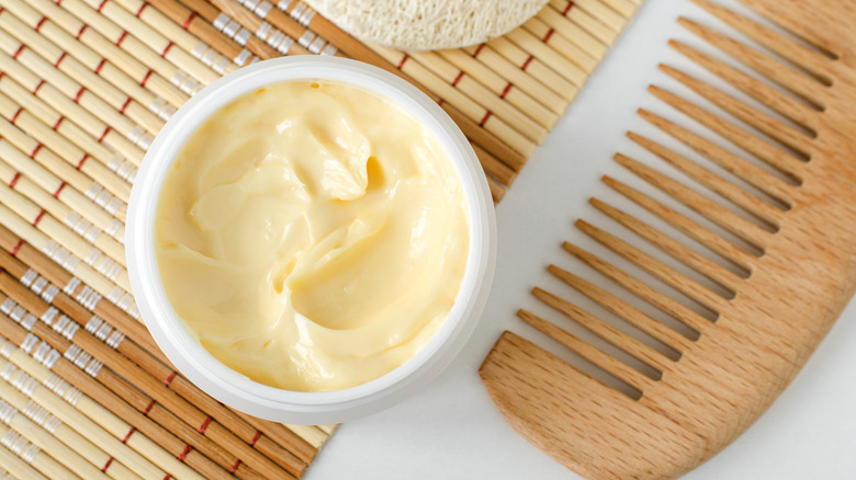 Bowl of mayonnaise and a comb