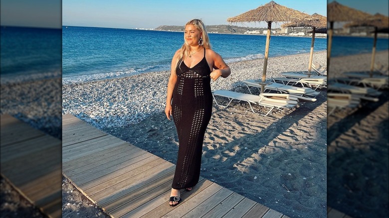 woman in an open-knit dress