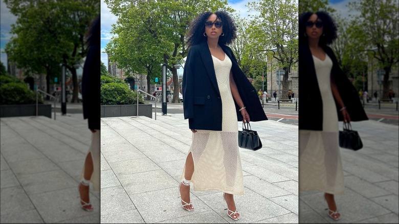 woman in an open-knit dress