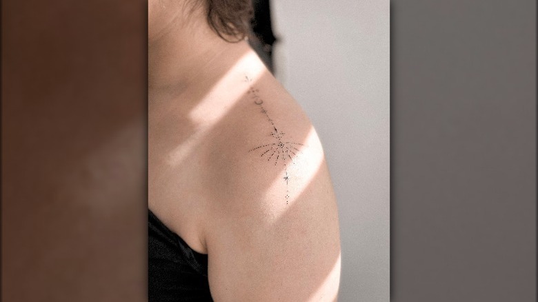 Woman with a fine line tattoo