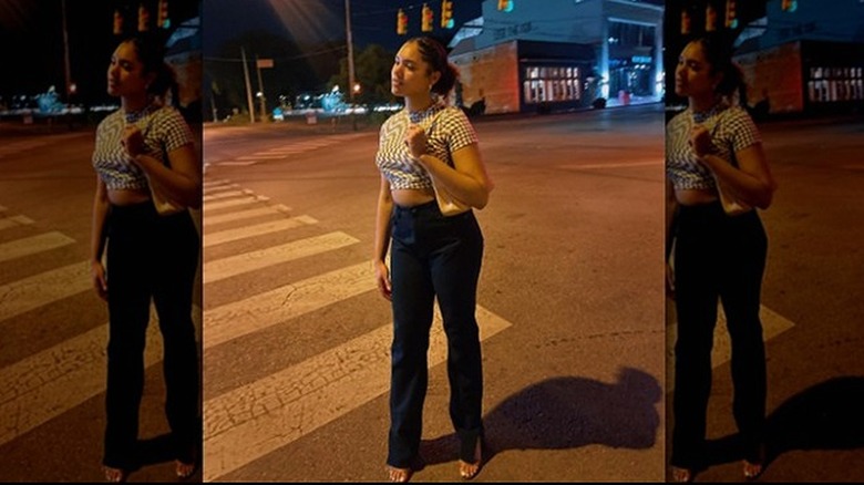 Statement top and split-hem jeans