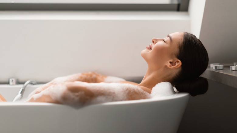 woman relaxing in bath