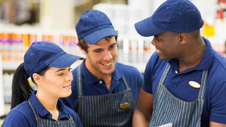 Store clerks talking to each other