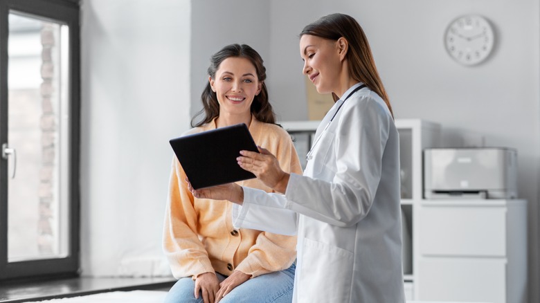 Doctor with female patient