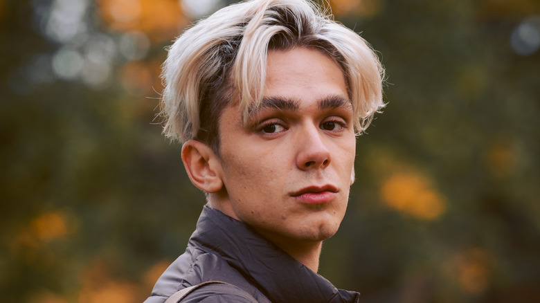 Bleached blond hair over undercut