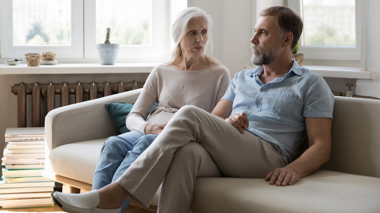 Couple talking at home
