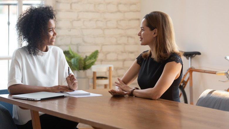 Two women interviewing