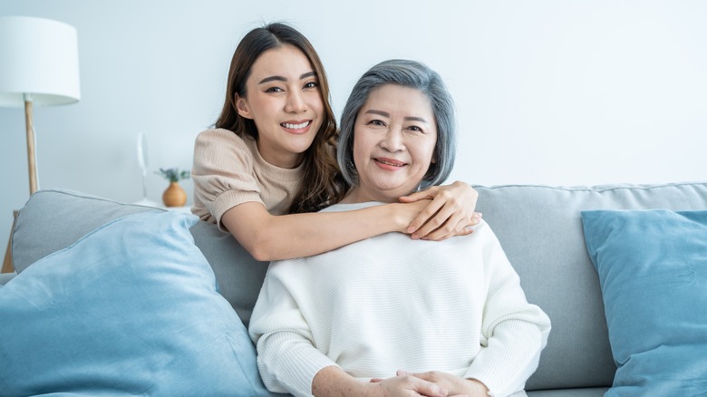 woman with mother smiling
