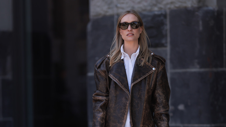 European celebrity wearing black sunglasses