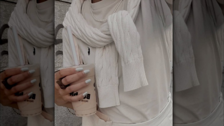 Person wearing all white outfit 