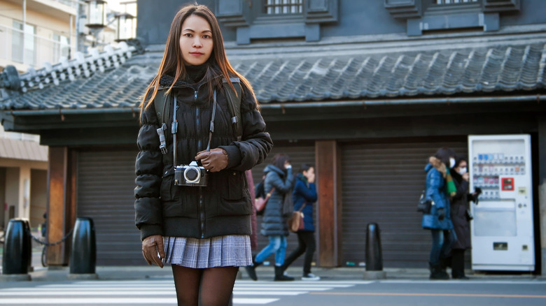 Girl in puffer jacket and miniskirt