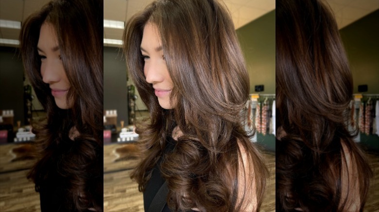 woman with medium brown hair highlights