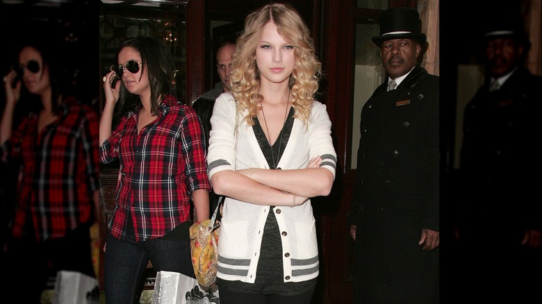 Taylor Swift wearing a cardigan