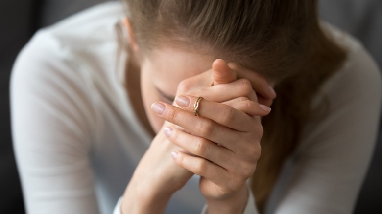 Sad woman looking down