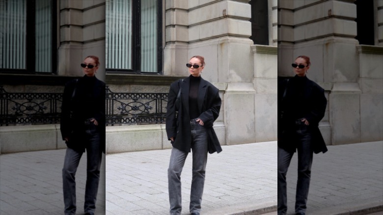 woman wearing black top and blazer