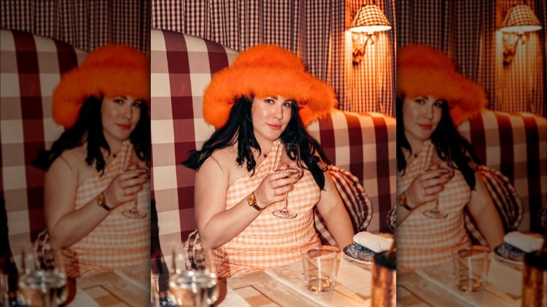 person in a gingham outfit