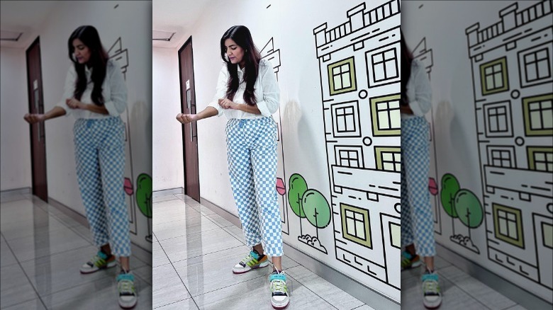 person in a gingham pants