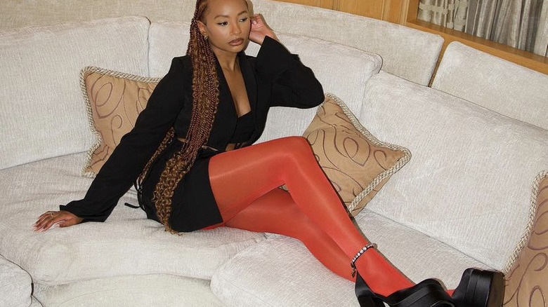 Temi Otedola sitting