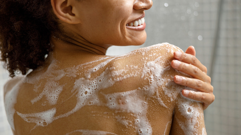 Woman using body wash