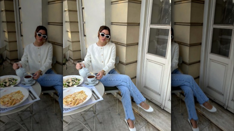 Girl wearing ballet flats with straight leg jeans.