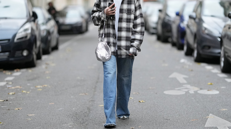 An outdated shacket and light-wash jeans