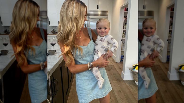 Christina Haack holds up her infant son