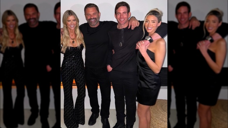 Christina Haack, Christopher Larocca, Tarek El Moussa, and Heather Rae El Moussa pose together for a photo