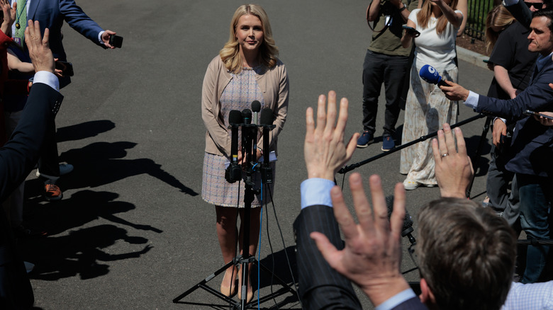 Karoline Leavitt in a dull outdated beige outfit