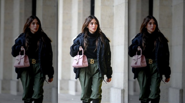 woman wearing black bomber jacket