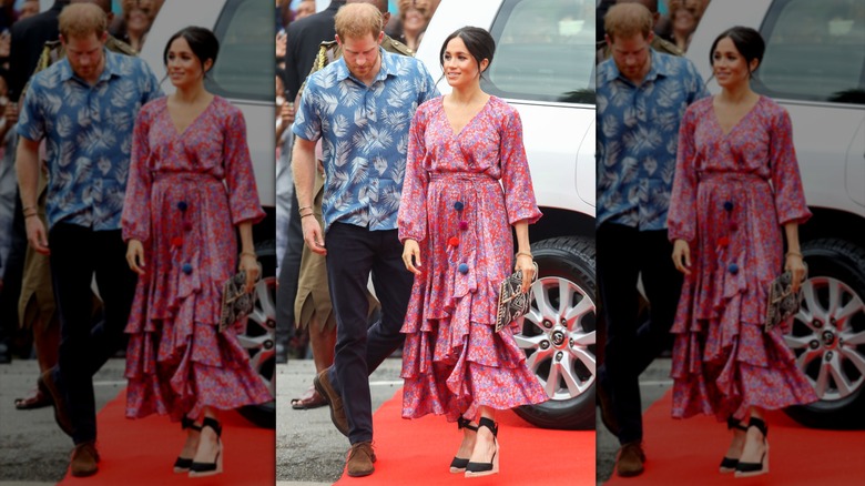 Meghan Markle pictured with Prince Harry wearing a floral maxi dress and espadrilles
