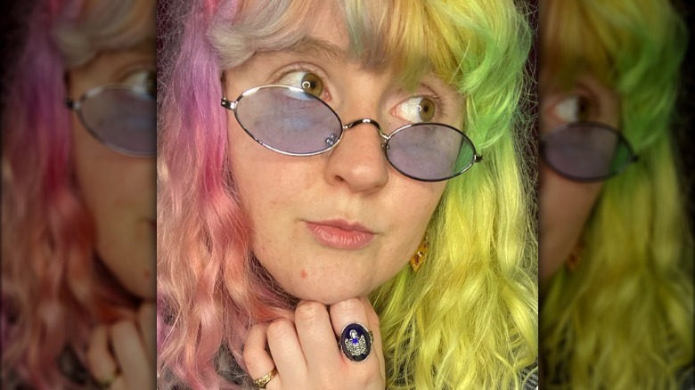 woman wearing oval glasses