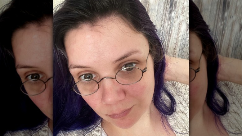 woman wearing oval glasses