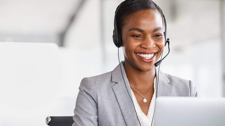 Woman at work, smiling