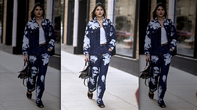 woman wearing denim jacket and jeans 