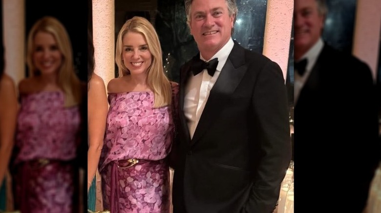 Pam Bondi and John Wakefield pose at a Mar-a-Lago party