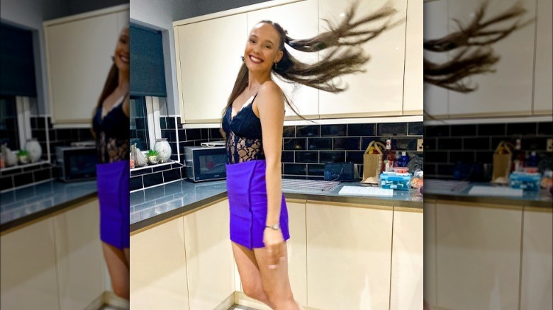 woman wearing purple miniskirt