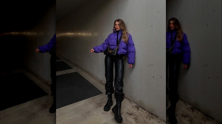 woman wearing purple puffer jacket