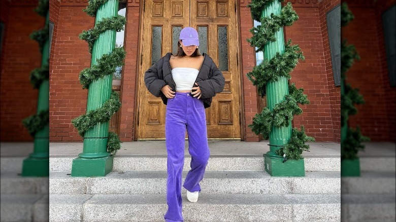 woman wearing purple pants