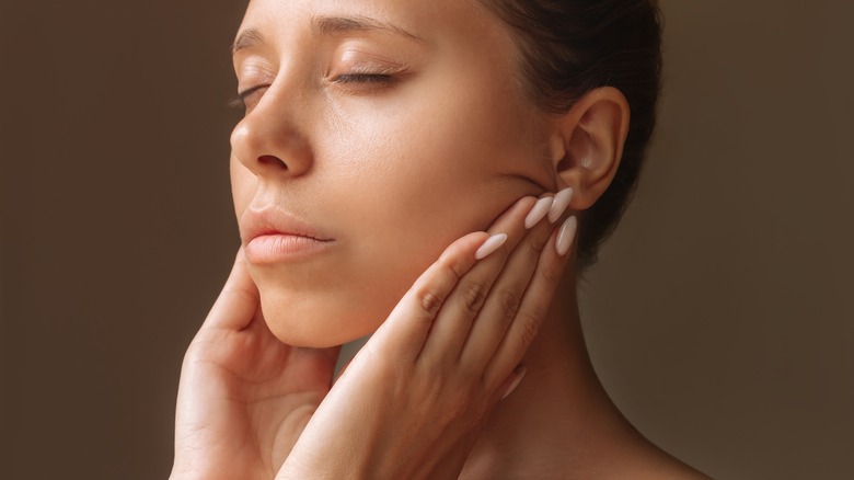 woman exercising jawline