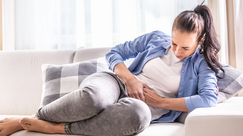 Woman having menstrual cramps 