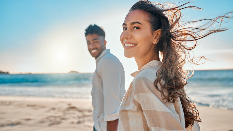 smiling couple on beach