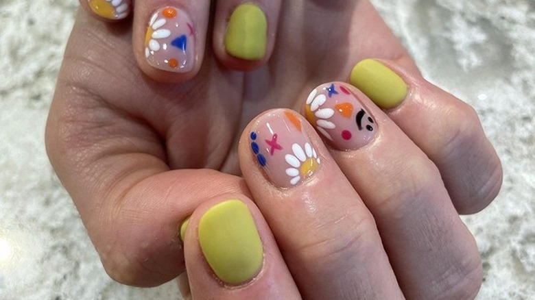 floral and pea green manicure